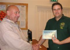Paul Hunt receives the highly commended certificate from Peter Blake